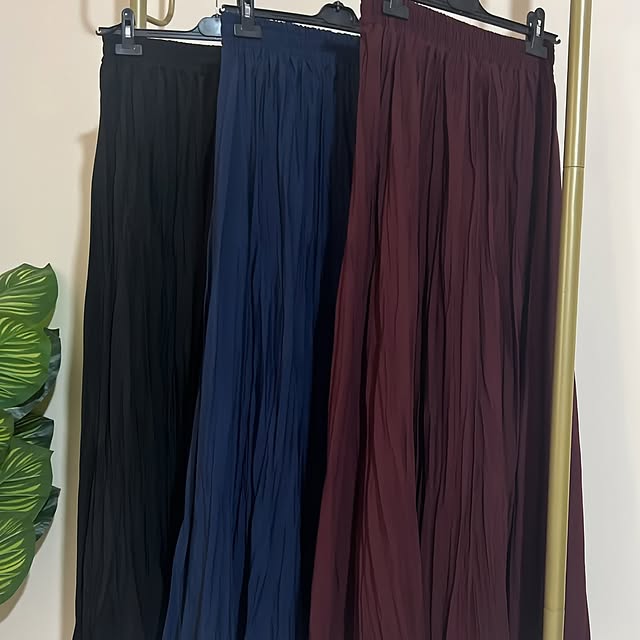 Black, navy, and burgundy skirts available in size...